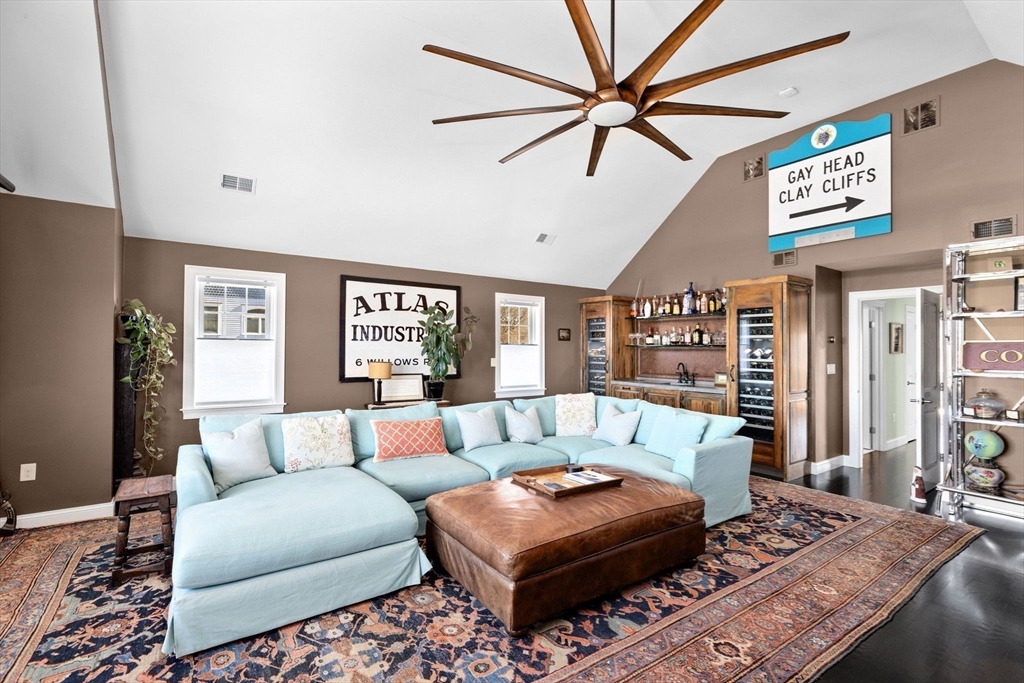 38 Gilson Road Scituate, MA 02066 - Photo 28 of 42 a living room with furniture and a rug