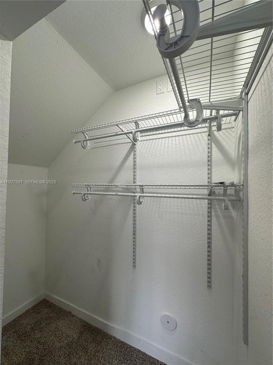 14573 Southwest 261st Terrace, Unit 14573 Homestead, FL 33032 - Photo 16 of 35 a bathroom with a shower