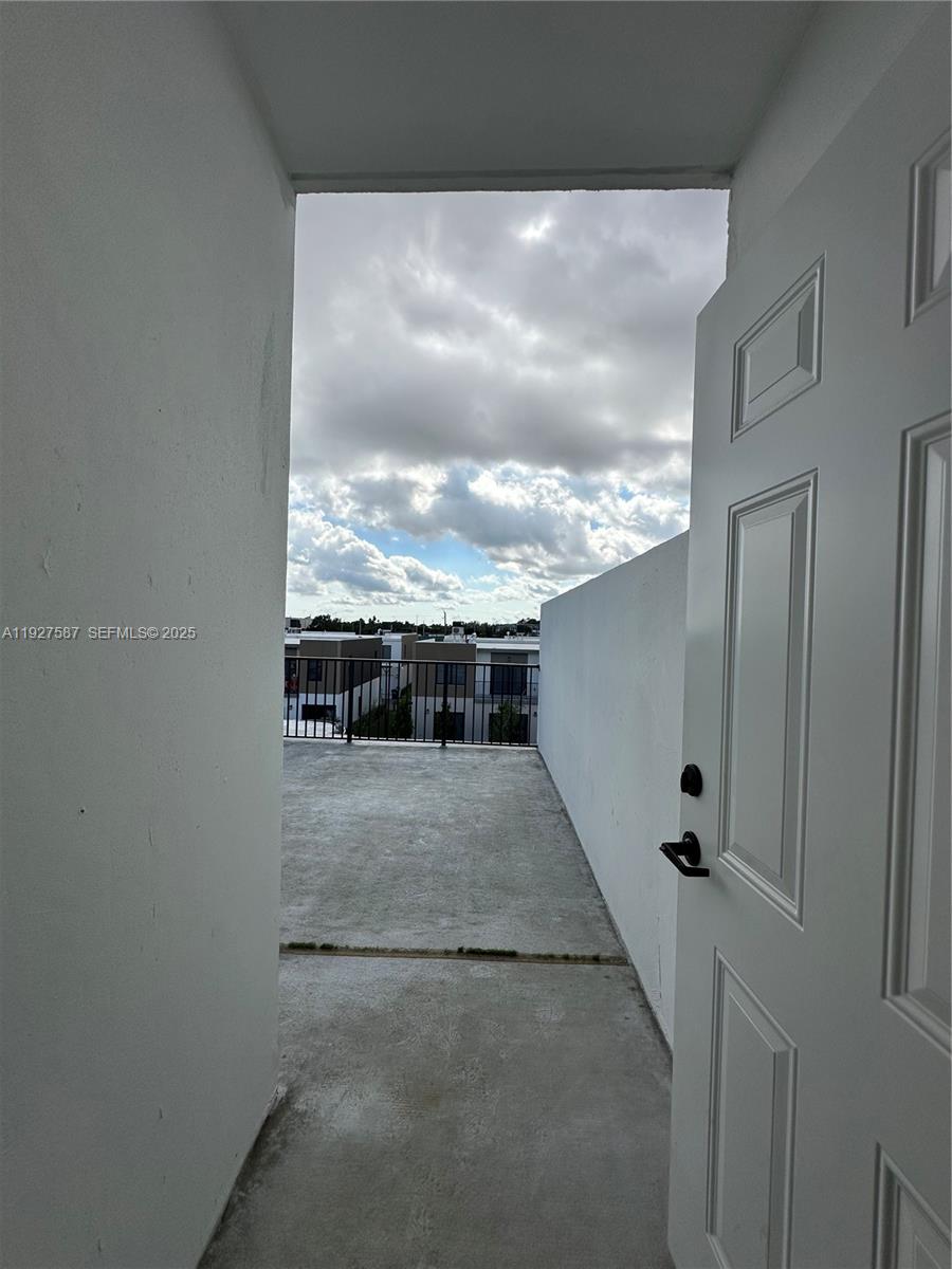 14573 Southwest 261st Terrace, Unit 14573 Homestead, FL 33032 - Photo 29 of 35 a view of a terrace