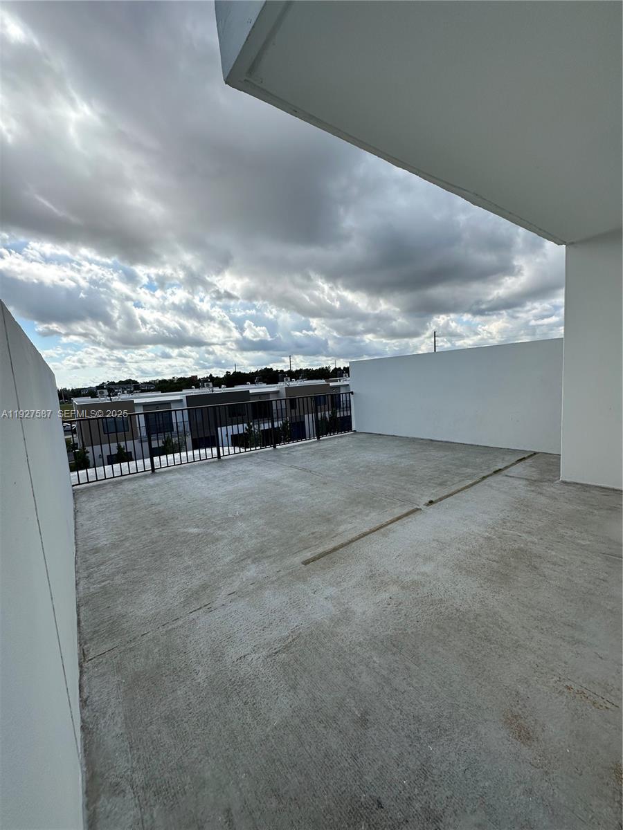 14573 Southwest 261st Terrace, Unit 14573 Homestead, FL 33032 - Photo 31 of 35 a view of a terrace