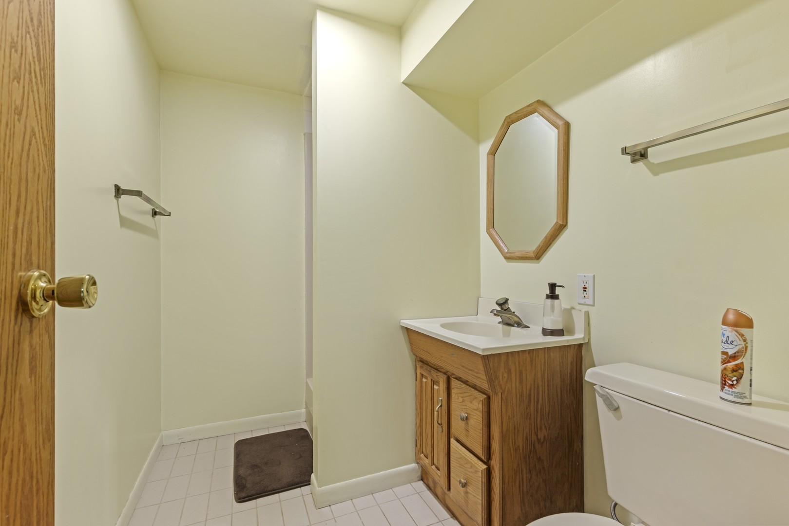 3626 Toft Street Rockford, IL 61114 - Photo 12 of 22 a bathroom with a sink toilet and a mirror