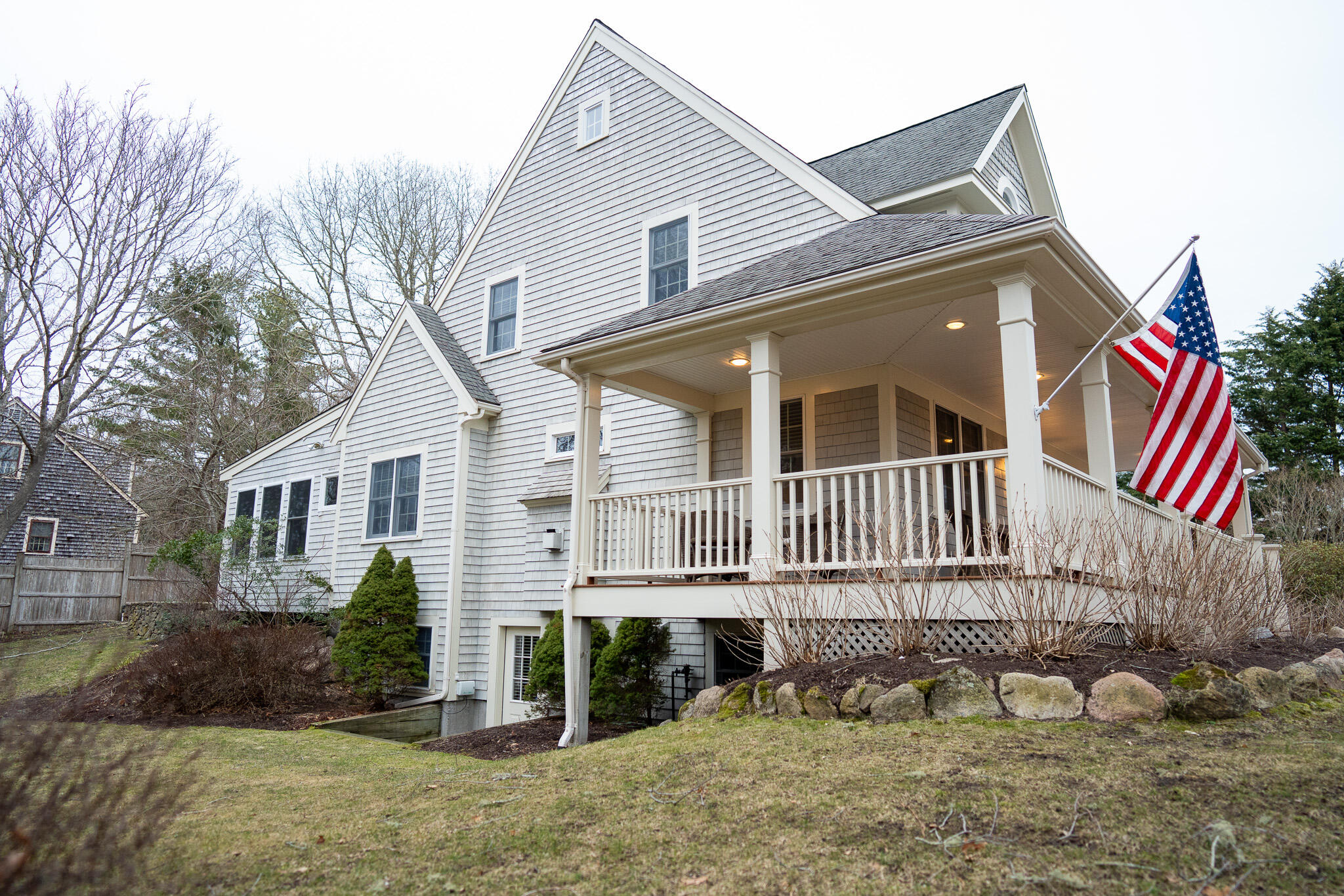 10 Abbey Gate Road Cotuit, MA 02635 - Photo 63 of 67 a front view of a house with a yard