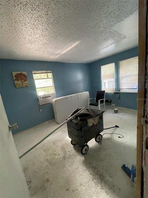 858 35th Avenue South St. Petersburg, FL 33705 - Photo 13 of 20 a living room with furniture and a window