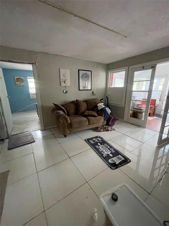 858 35th Avenue South St. Petersburg, FL 33705 - Photo 16 of 20 a living room with furniture and a window