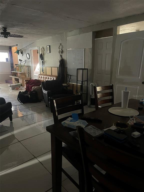 858 35th Avenue South St. Petersburg, FL 33705 - Photo 18 of 20 a living room with furniture and a mirror