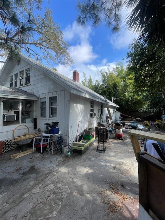 858 35th Avenue South St. Petersburg, FL 33705 - Photo 9 of 20 a view of a tables and chairs in a patio