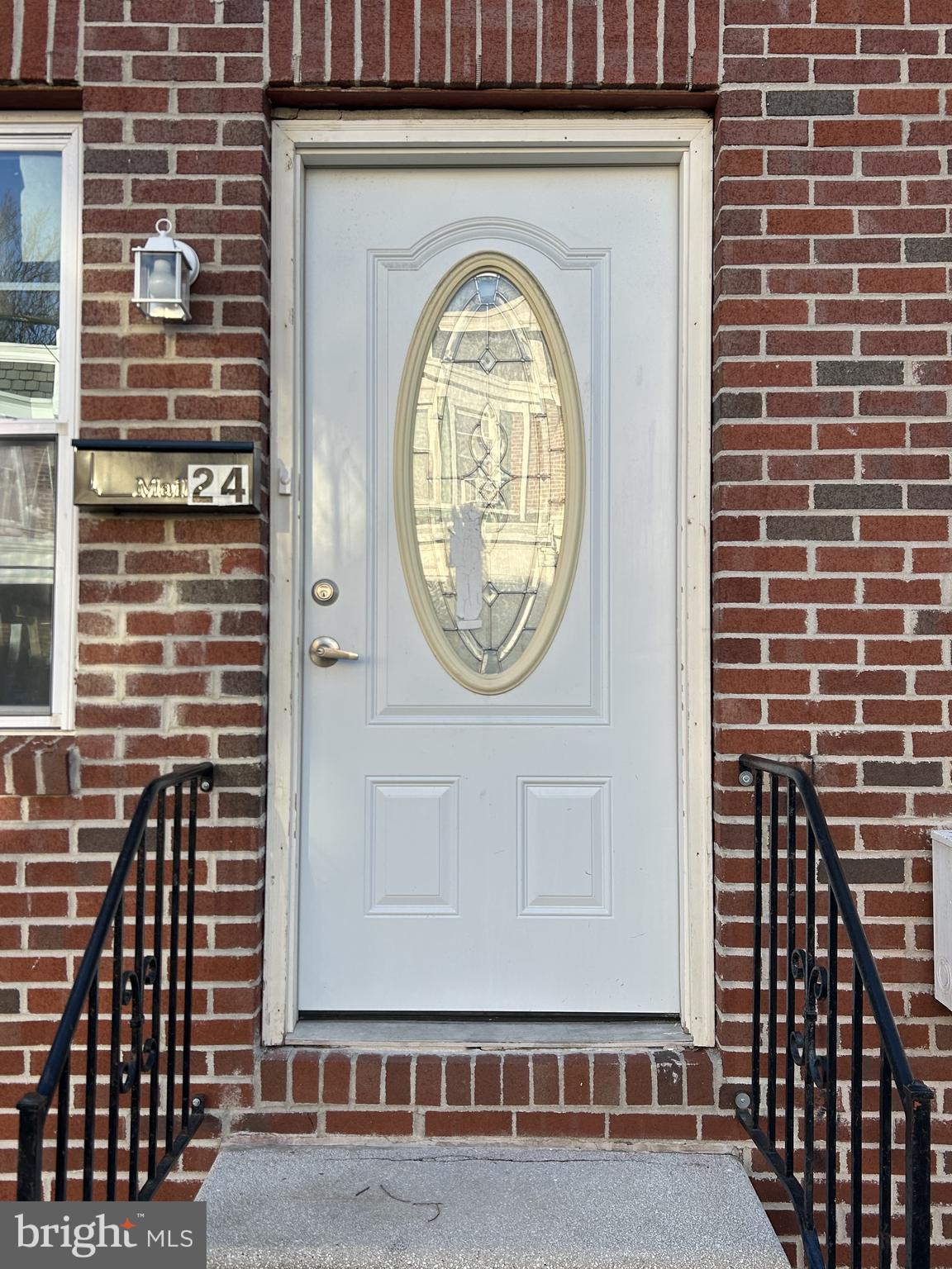 24 West 20th Street Wilmington, DE 19802 - Photo 2 of 9 a front view of a house with garden