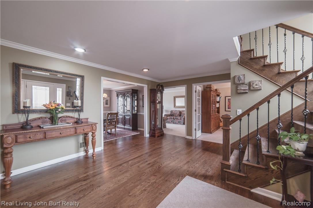 3778 Summit Ridge Drive Rochester, MI 48306 - Photo 3 of 37 Warm welcoming foyer with hardwood flooring
