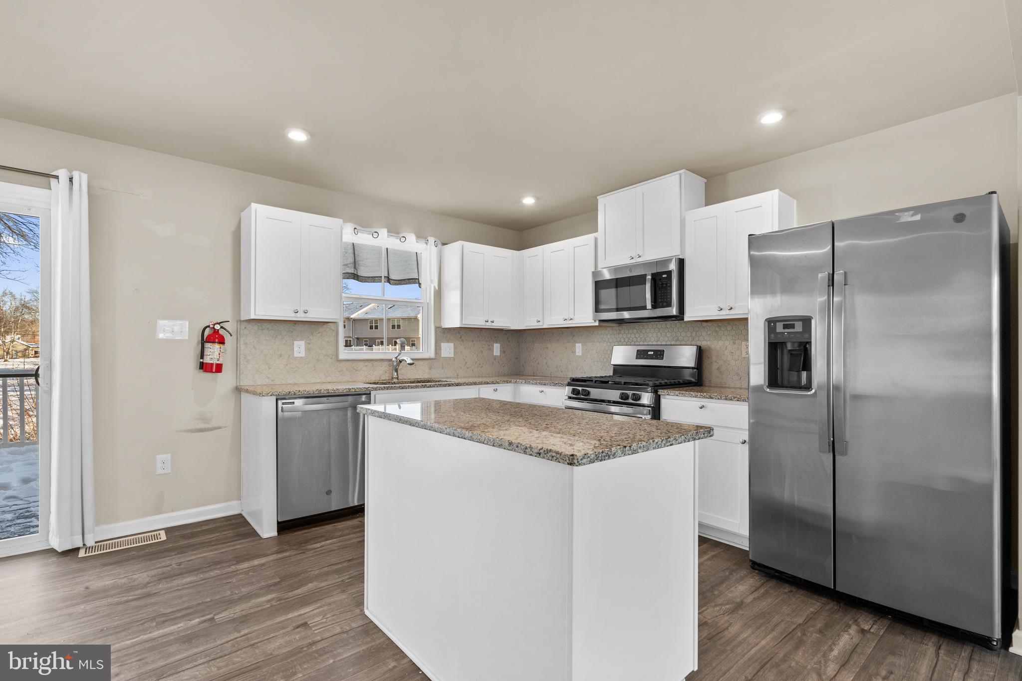 117 Comfort Road Williamstown, NJ 08094 - Photo 5 of 23 a kitchen with stainless steel appliances granite countertop a refrigerator stove microwave and sink