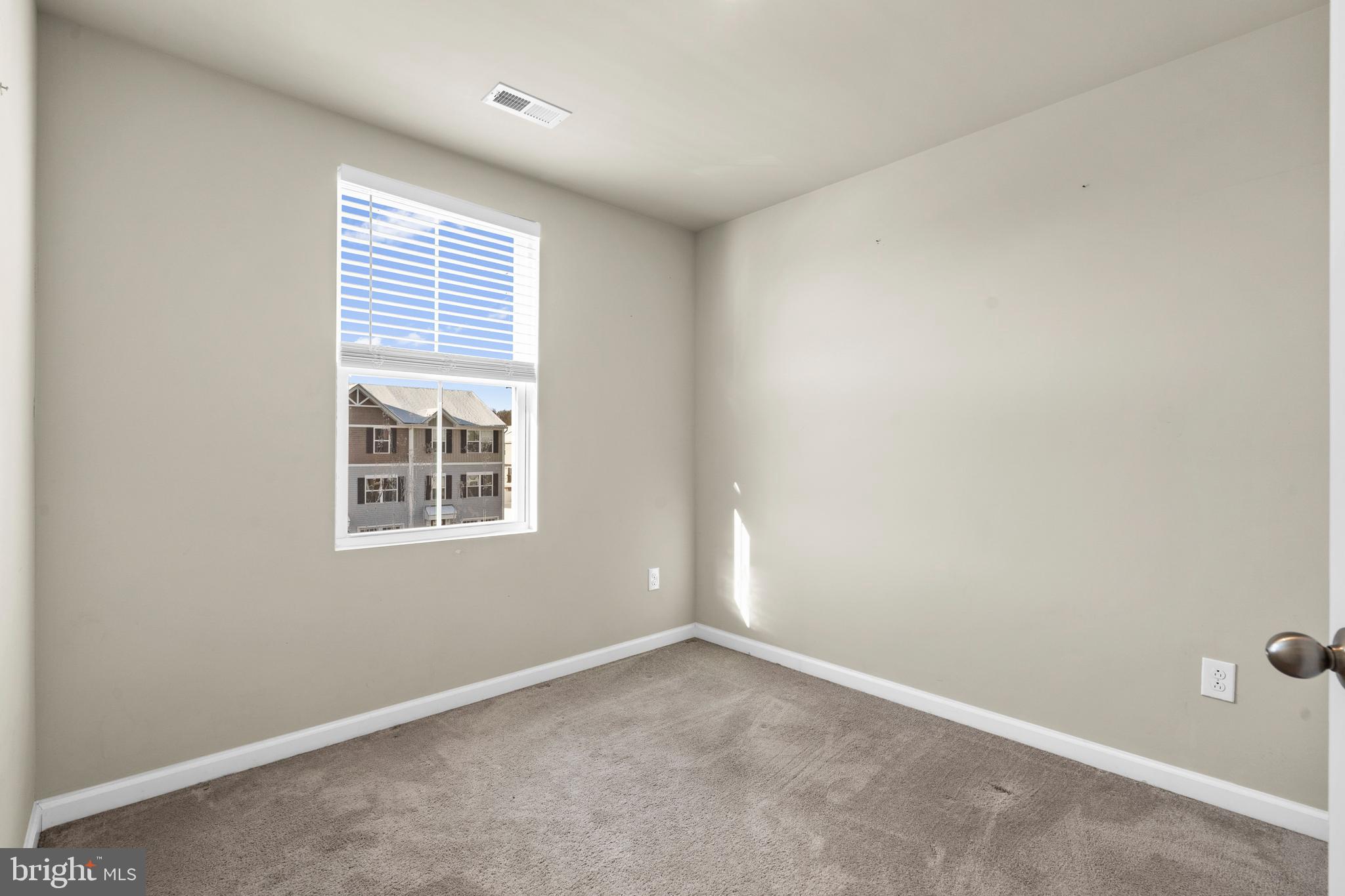 117 Comfort Road Williamstown, NJ 08094 - Photo 10 of 23 an empty room with windows