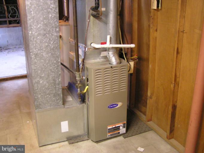 140 Magothy Beach Road Pasadena, MD 21122 - Photo 26 of 28 Gas furnace in lower level