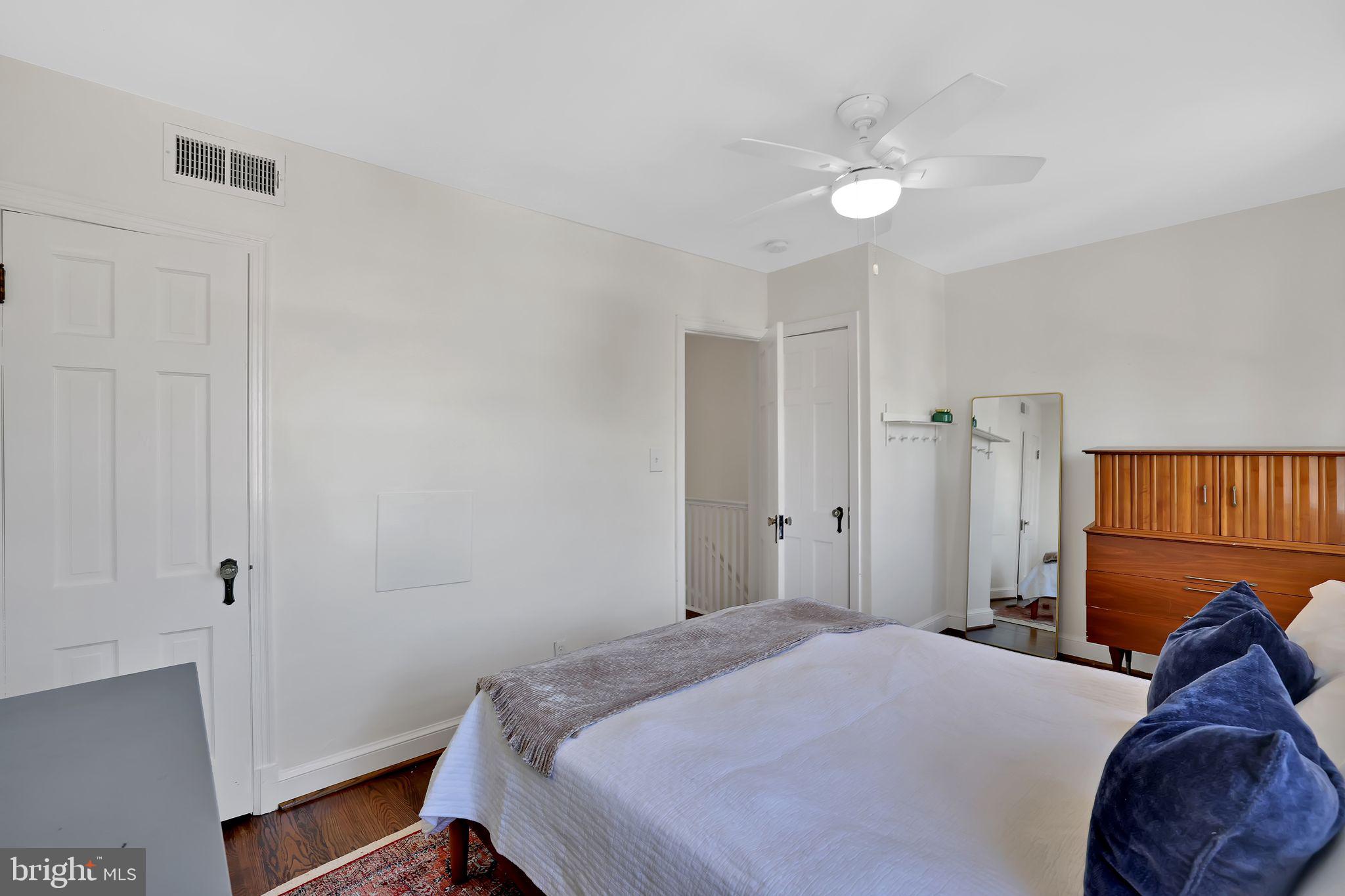 1719 Lyman Place Northeast Washington, DC 20002 - Photo 19 of 32 a bedroom with a bed and a closet