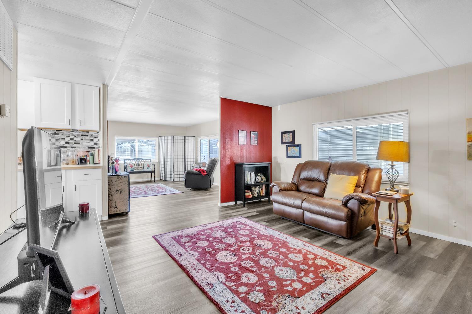 3901 Lake Road, Unit 76 West Sacramento, CA 95691 - Photo 12 of 29 a living room with furniture and a rug