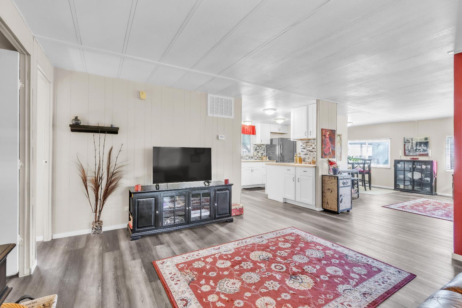 3901 Lake Road, Unit 76 West Sacramento, CA 95691 - Photo 13 of 29 a living room with furniture and a flat screen tv