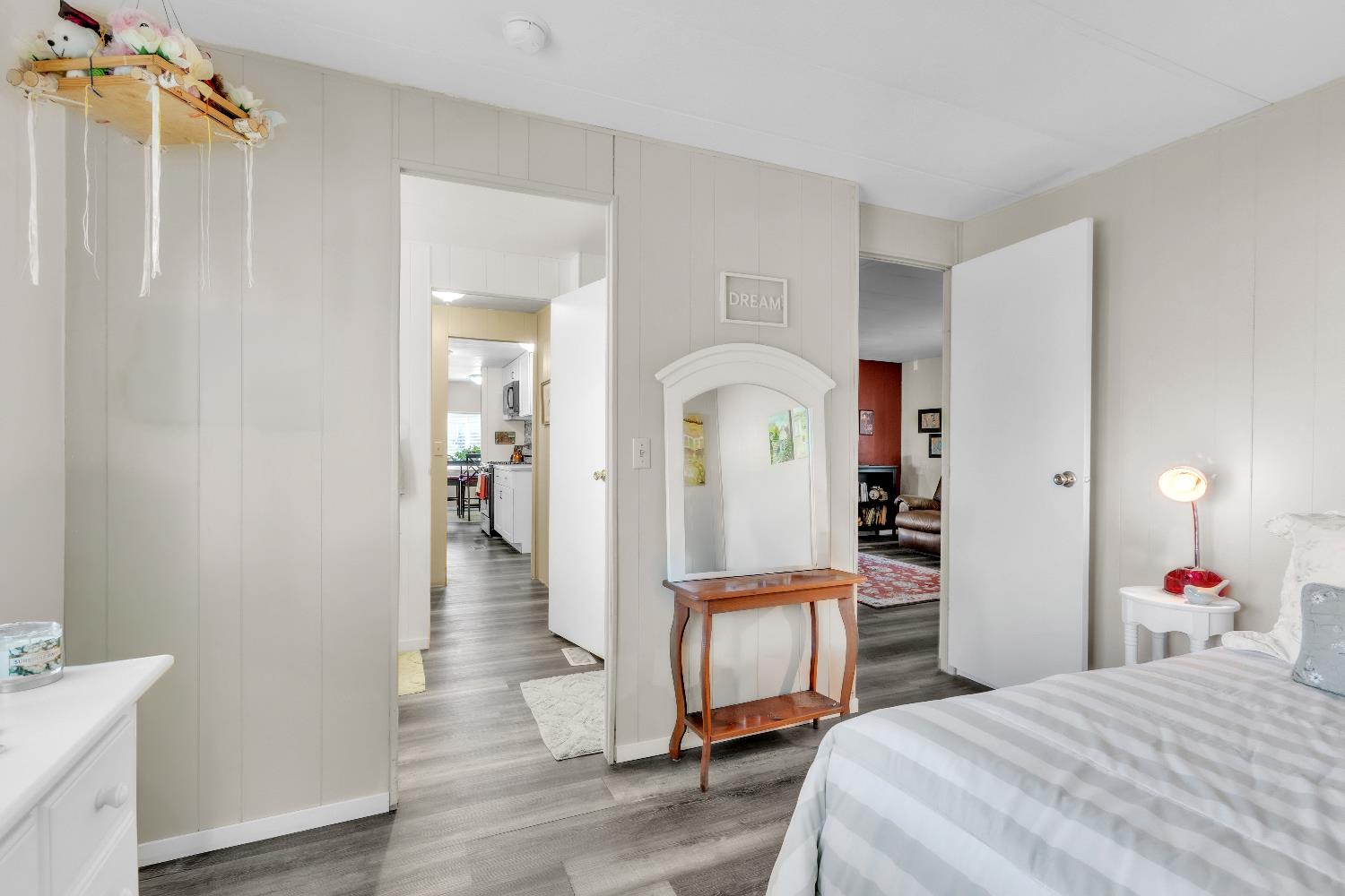 3901 Lake Road, Unit 76 West Sacramento, CA 95691 - Photo 18 of 29 a bedroom with a bed and a mirror