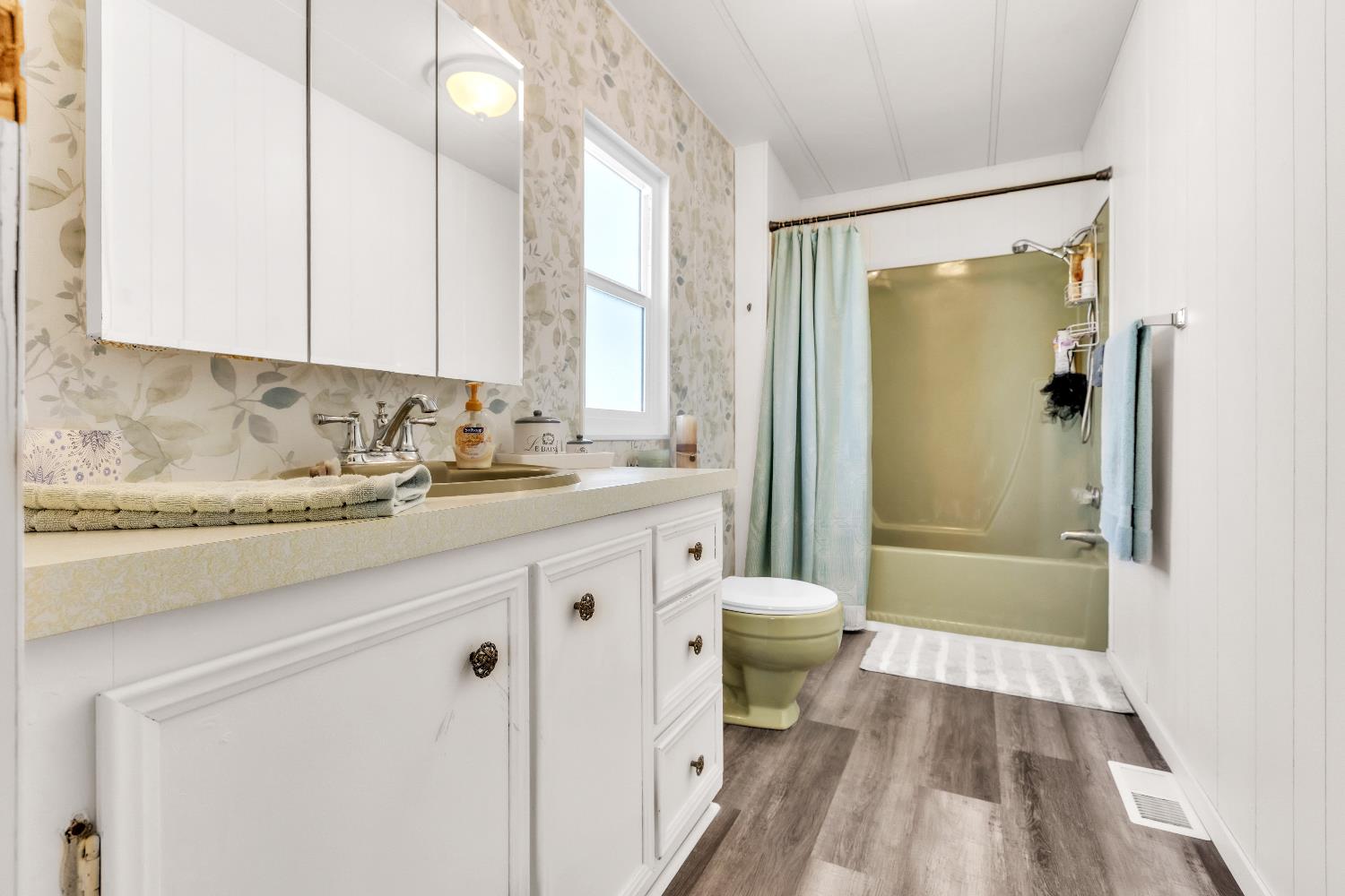 3901 Lake Road, Unit 76 West Sacramento, CA 95691 - Photo 22 of 29 a bathroom with a sink a toilet and shower
