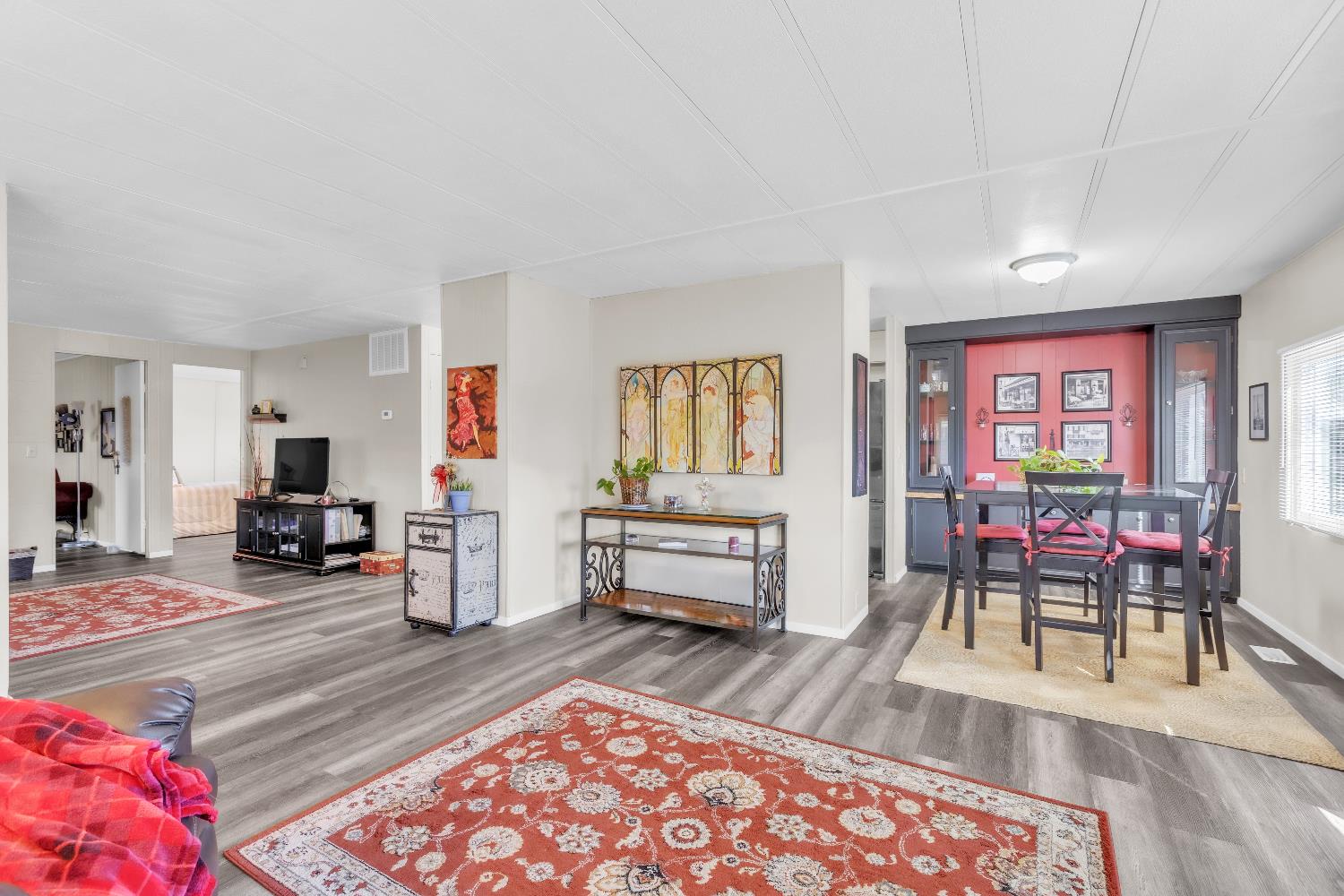 3901 Lake Road, Unit 76 West Sacramento, CA 95691 - Photo 4 of 29 a living room with furniture and a wooden floor