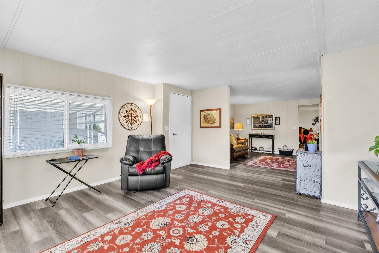 3901 Lake Road, Unit 76 West Sacramento, CA 95691 - Photo 5 of 29 a living room with furniture and a wooden floor