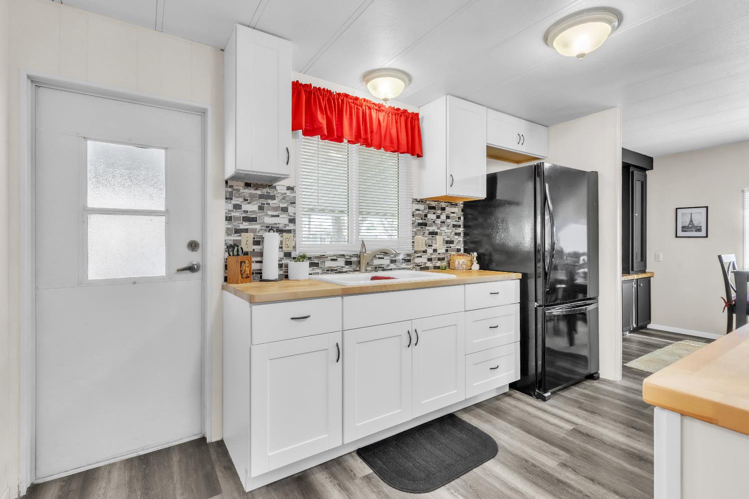 3901 Lake Road, Unit 76 West Sacramento, CA 95691 - Photo 9 of 29 a kitchen with stainless steel appliances cabinets and a window