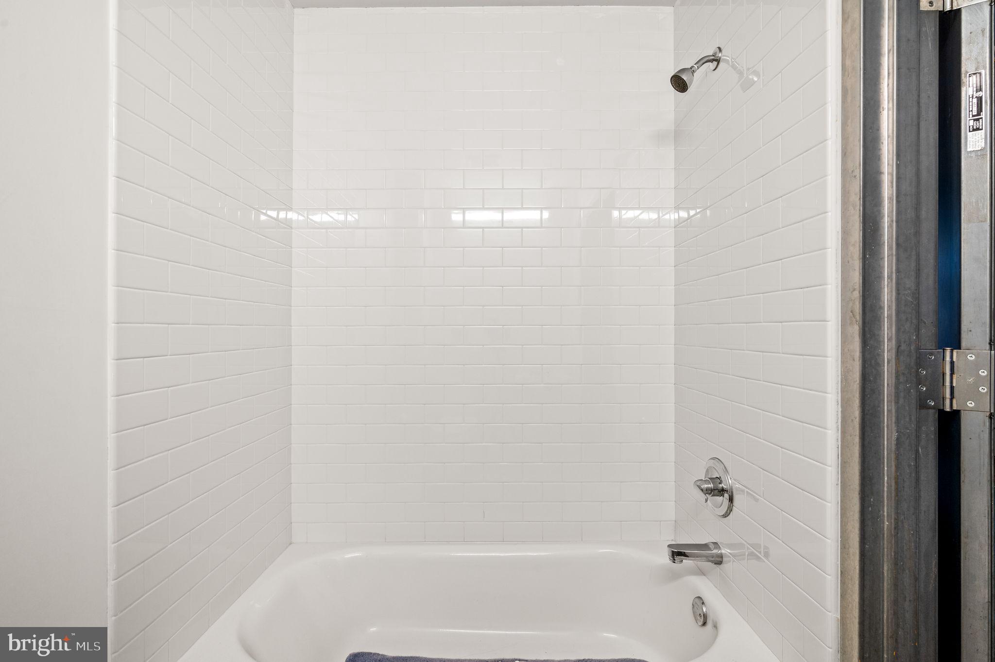 20 North 3rd Street, Unit 201 Philadelphia, PA 19106 - Photo 10 of 11 a close up of a bathtub