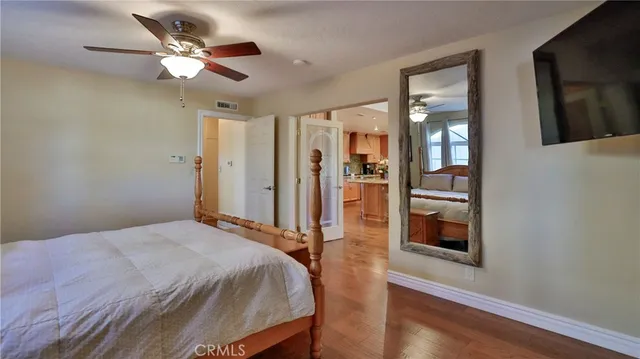 a view of walk in closet with clothes