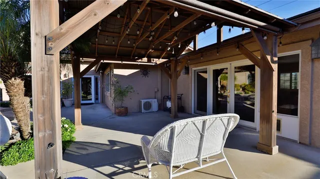 an aerial view of a house with garden space and street view