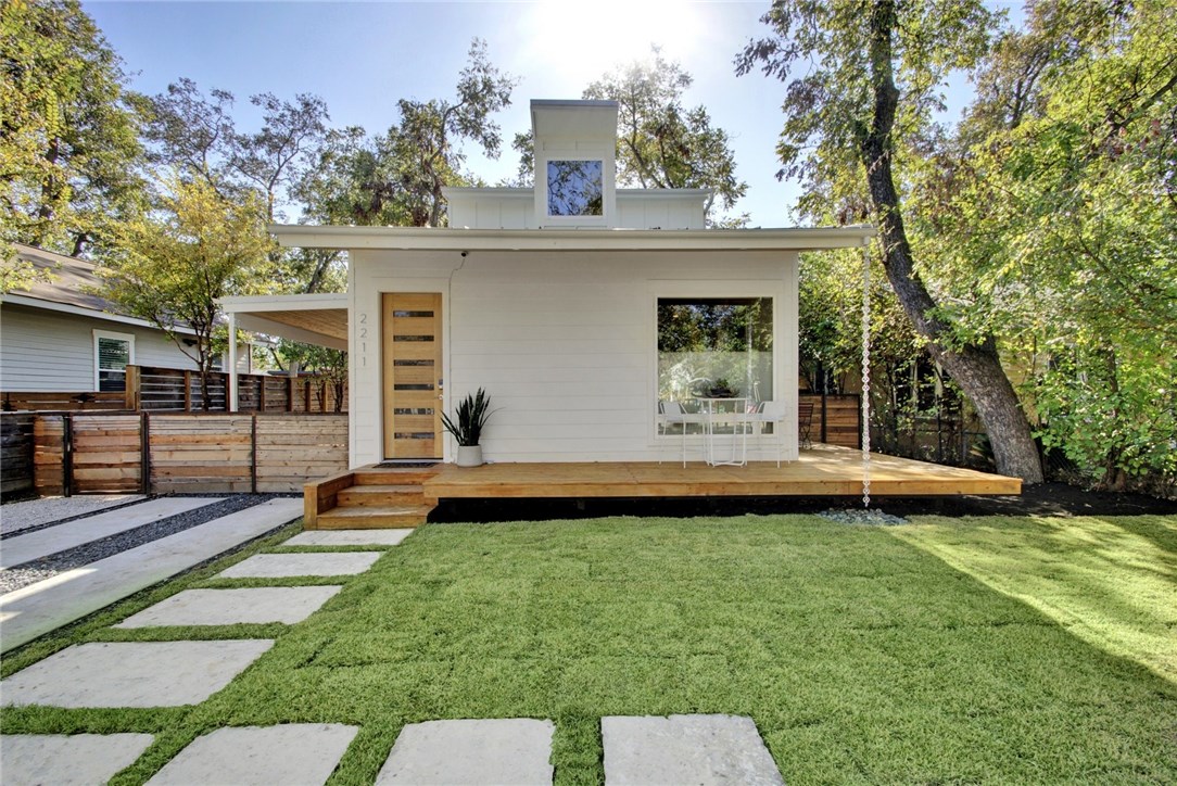 2211 Canterbury Street Austin, TX 78702 - Photo 1 of 1 a view of a house with backyard and sitting area