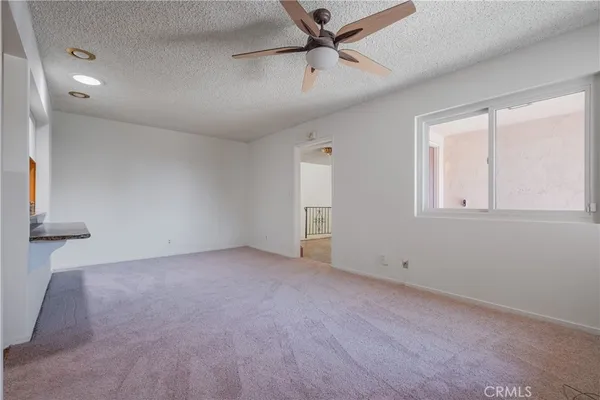 a view of room with hardwood floor