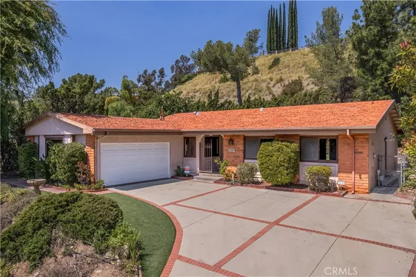 a view of a lake with a building in the background