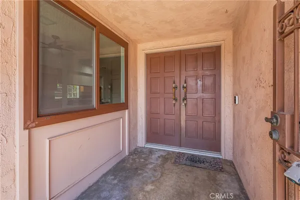 view of an empty room with a bathroom