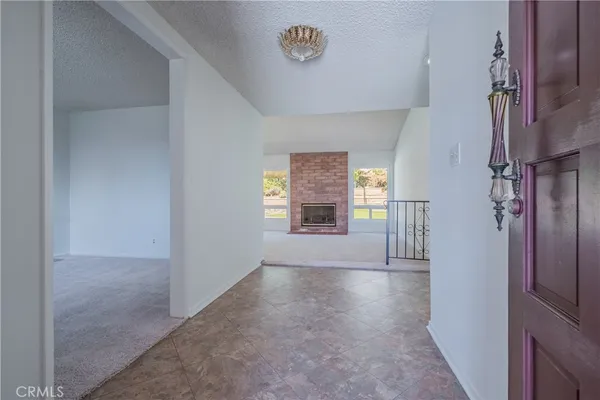 a view of empty room with front door