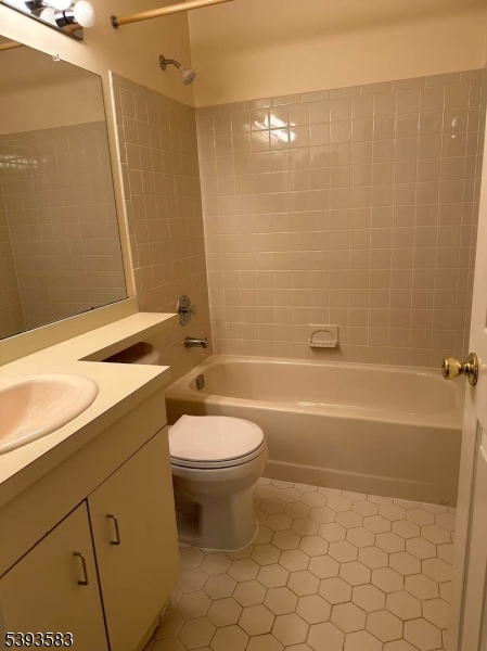 604 Bayley Court Bridgewater, NJ 08807 - Photo 12 of 15 a bathroom with a sink a toilet and shower