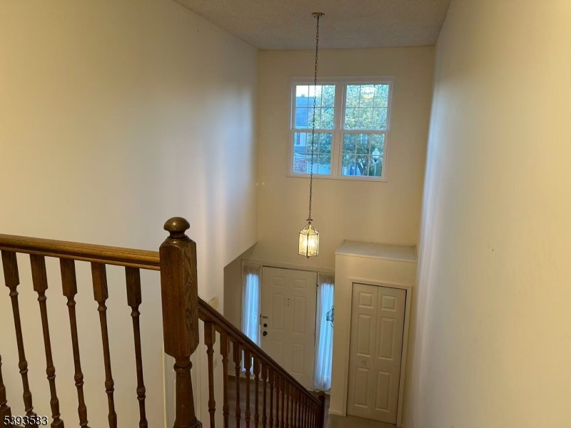 604 Bayley Court Bridgewater, NJ 08807 - Photo 13 of 15 a view of a hallway with windows