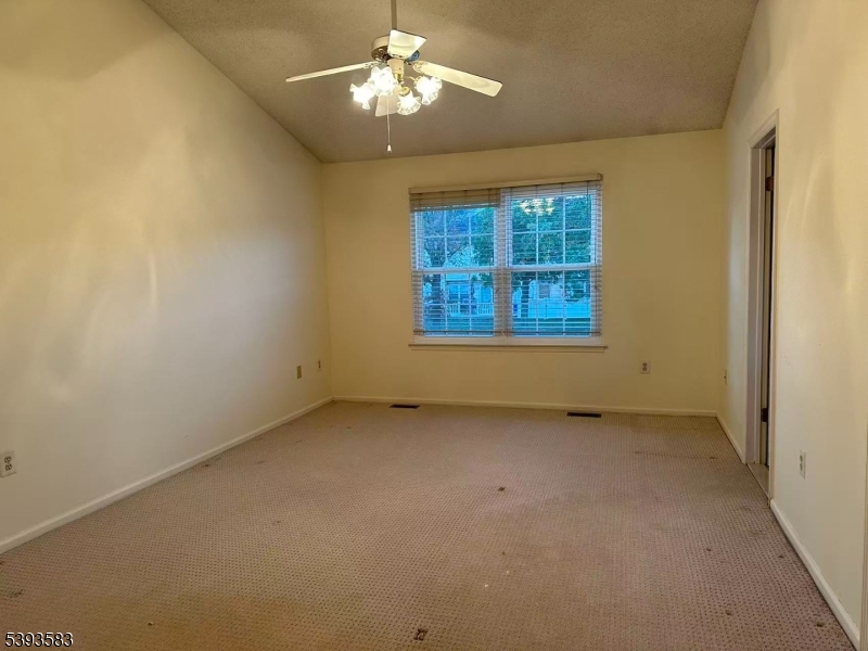 604 Bayley Court Bridgewater, NJ 08807 - Photo 6 of 15 an empty room with a window