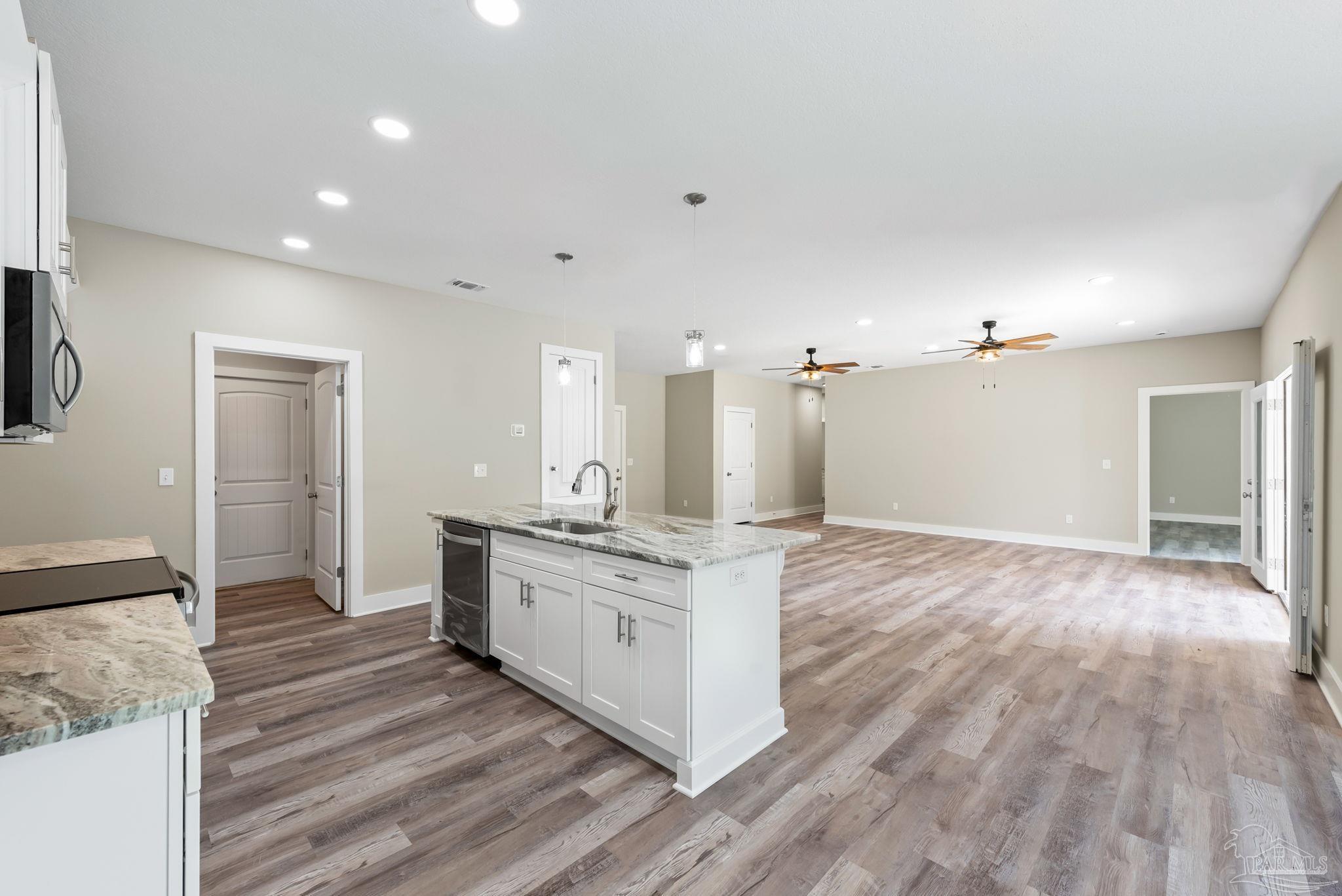 8261 Larson Lane Milton, FL 32583 - Photo 25 of 47 a bathroom with a sink and a mirror