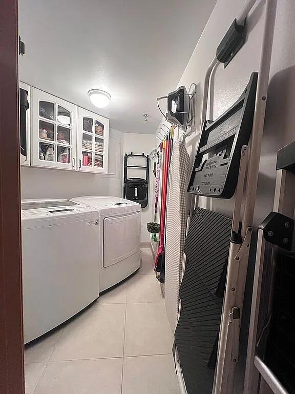 6463 La Costa Drive, Unit 105 Boca Raton, FL 33433 - Photo 32 of 40 a utility room with dryer and washer
