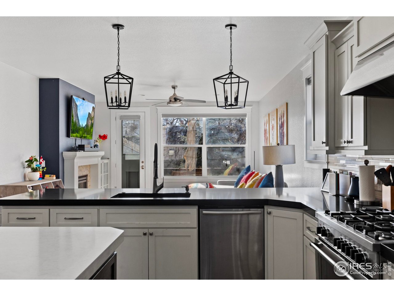 1201 Juniper Court Fort Collins, CO 80521 - Photo 17 of 50 a view of a kitchen with appliances and a counter top space