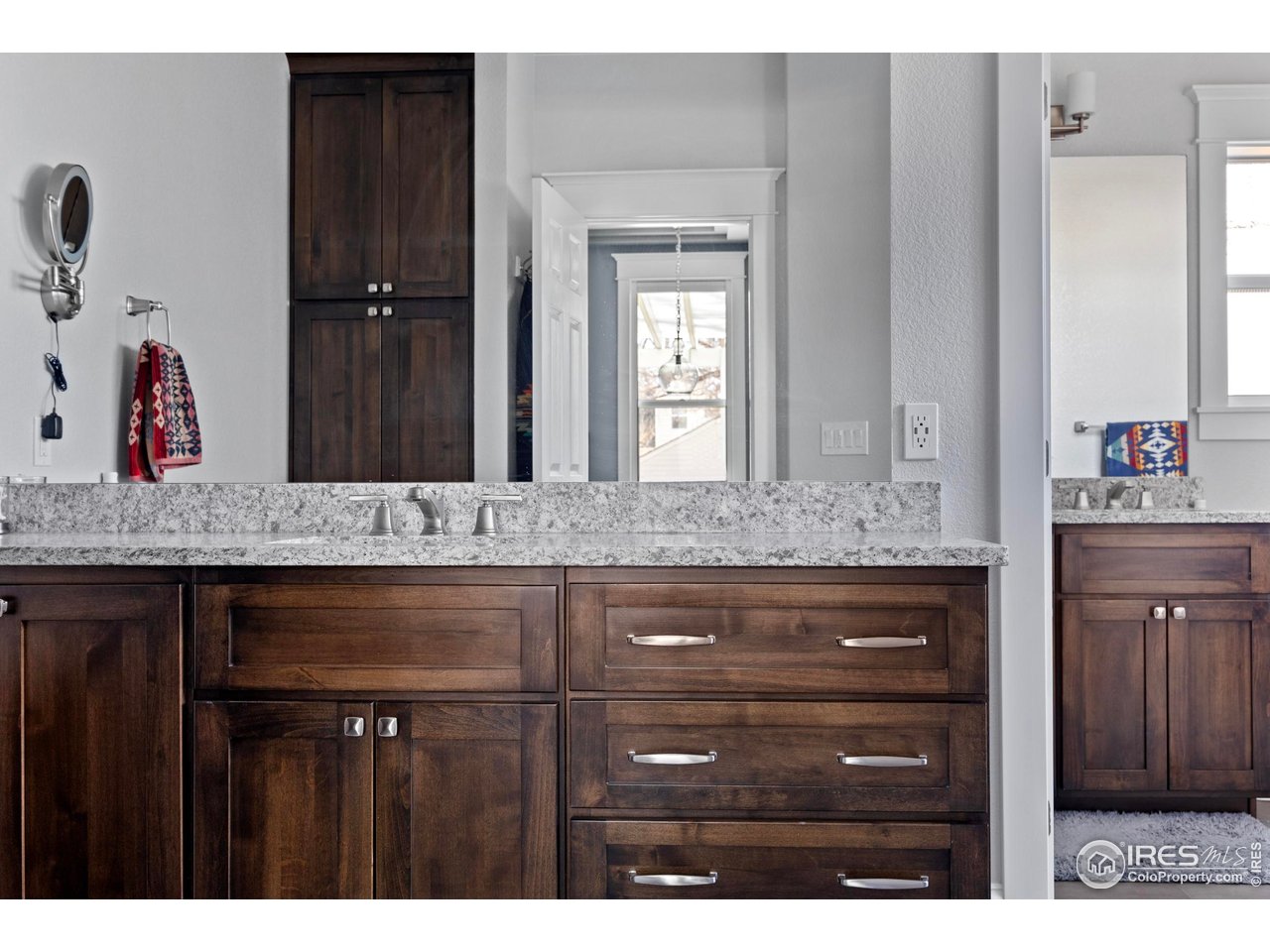 1201 Juniper Court Fort Collins, CO 80521 - Photo 24 of 50 a view of a sink and mirror