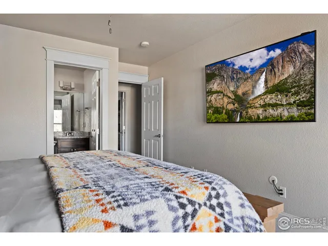 a bathroom with a sink toilet and mirror