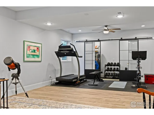 a kitchen with a sink cabinets and dining table