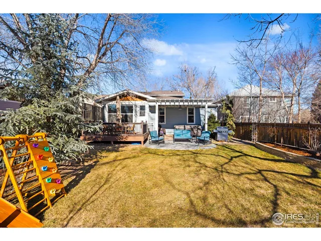 a backyard of a house with seating space