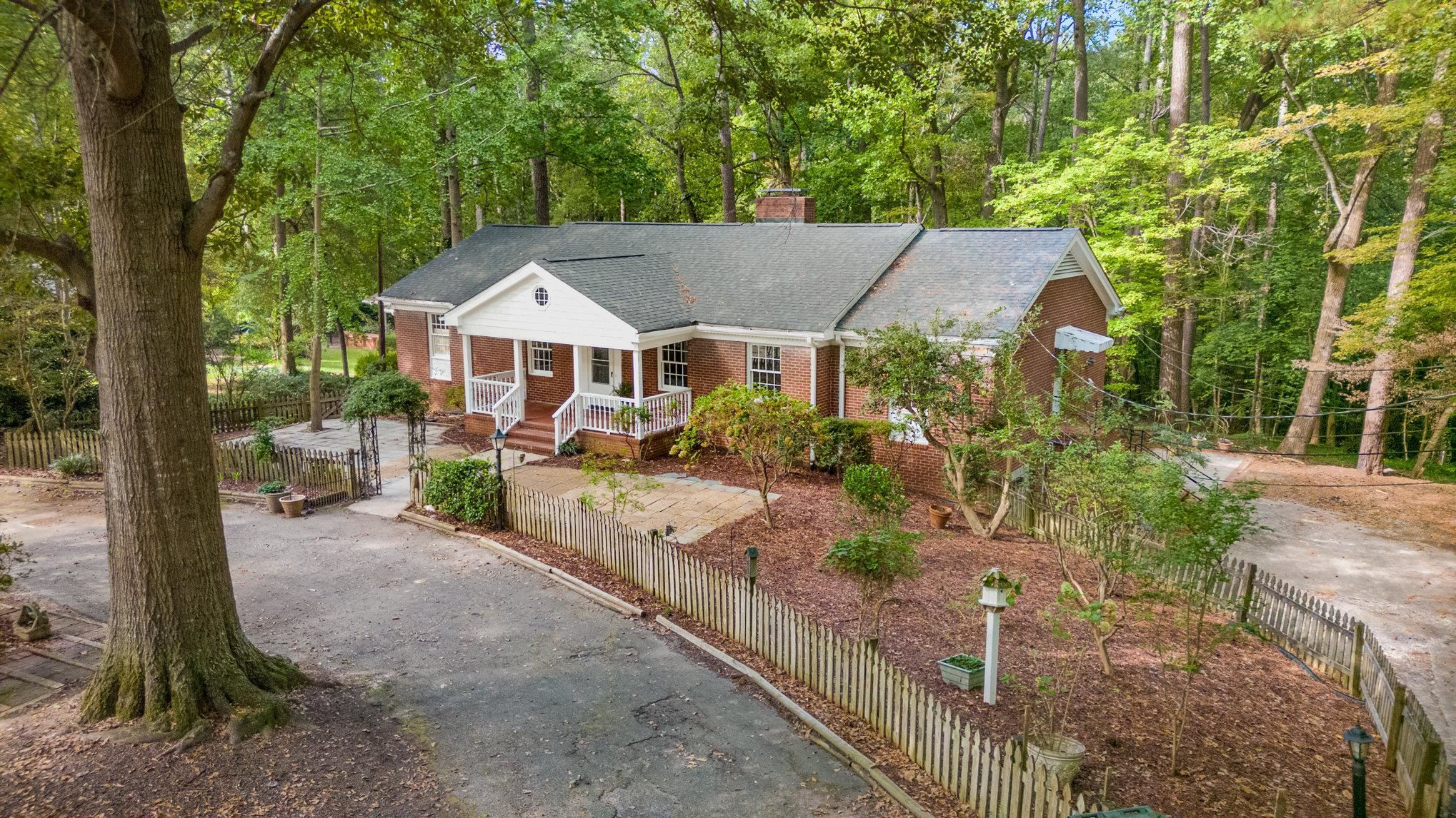 4921 Brookhaven Drive Raleigh, NC 27612 - Photo 35 of 39 Convenient circular drive in front with minimal stairs into the front entrance. Circular drive