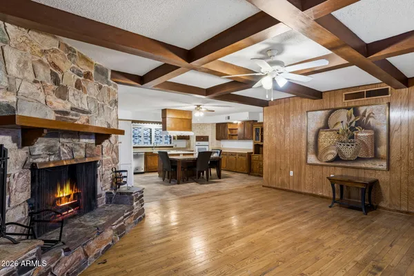 a dinning table and chairs in a kitchen