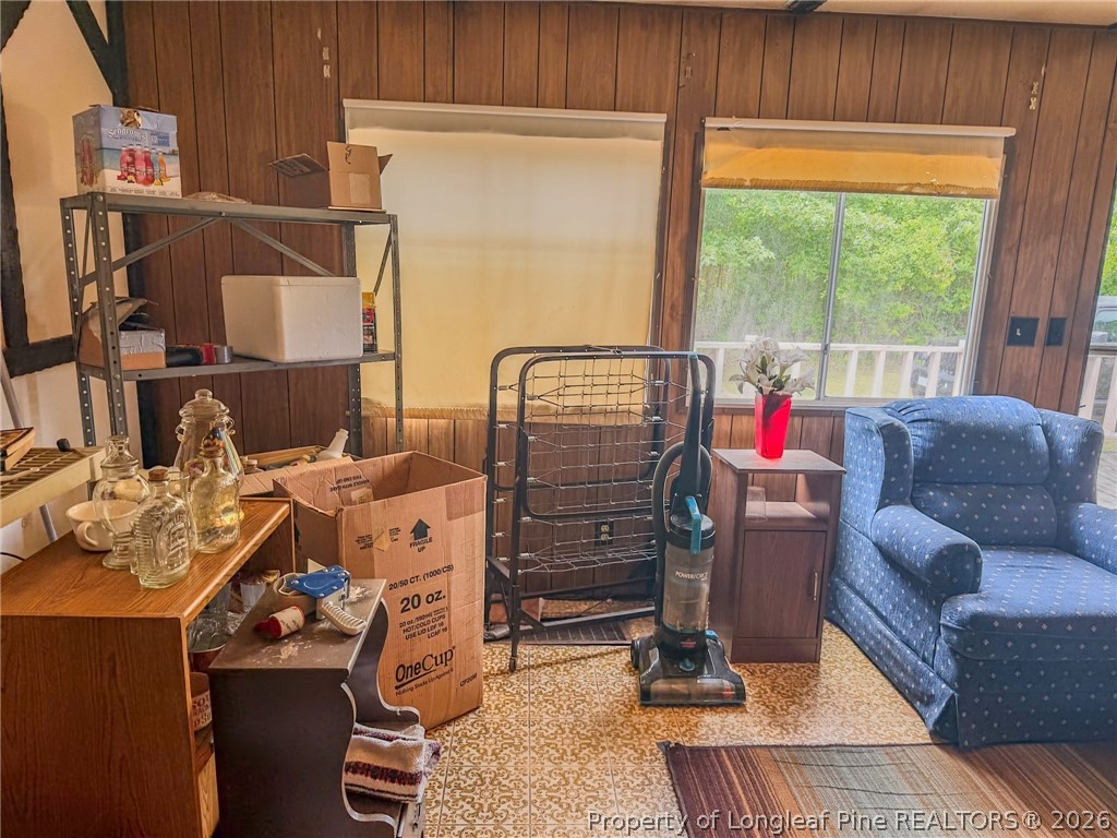 1308 Mac D Road Orrum, NC 28369 - Photo 6 of 32 a living room with furniture a window and a couch