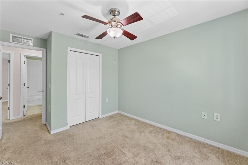 9450 Ivy Brook Run, Unit 602 Fort Myers, FL 33913 - Photo 17 of 34 an empty room