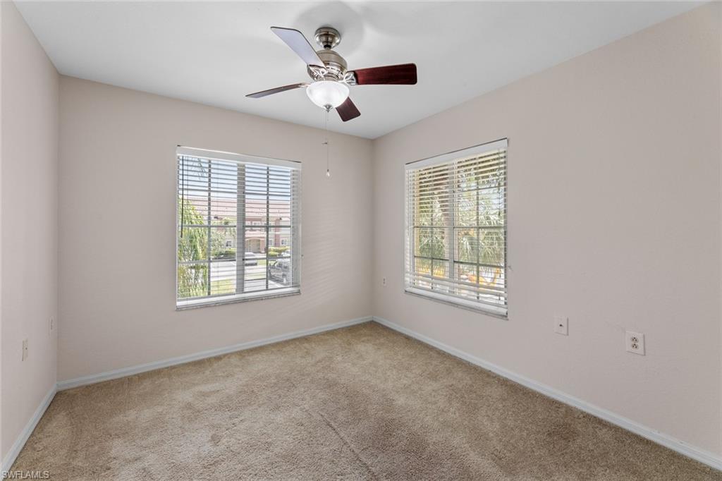 9450 Ivy Brook Run, Unit 602 Fort Myers, FL 33913 - Photo 19 of 34 a view of an empty room with a window