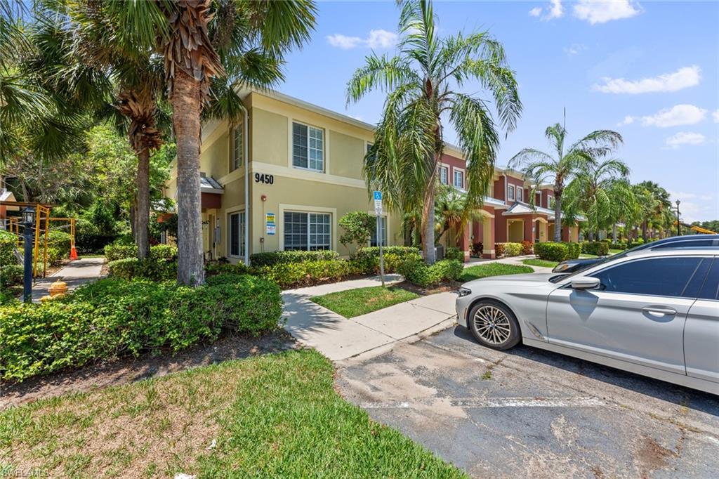 9450 Ivy Brook Run, Unit 602 Fort Myers, FL 33913 - Photo 24 of 34 a front view of a house with garden