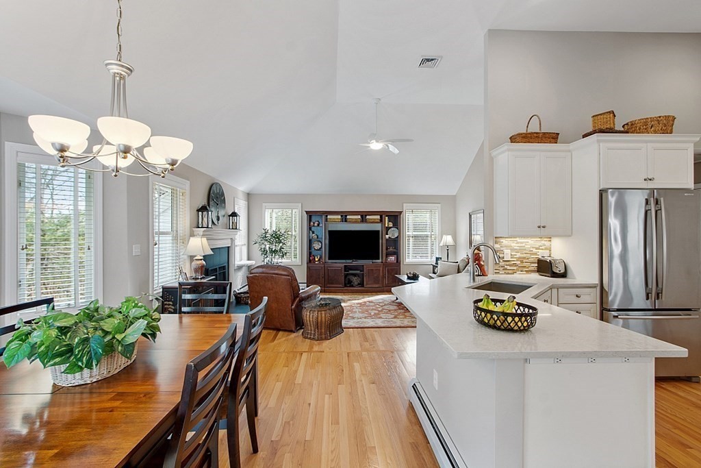 9 Joco Drive Tyngsborough, MA 01879 - Photo 12 of 38 a kitchen with sink refrigerator and microwave