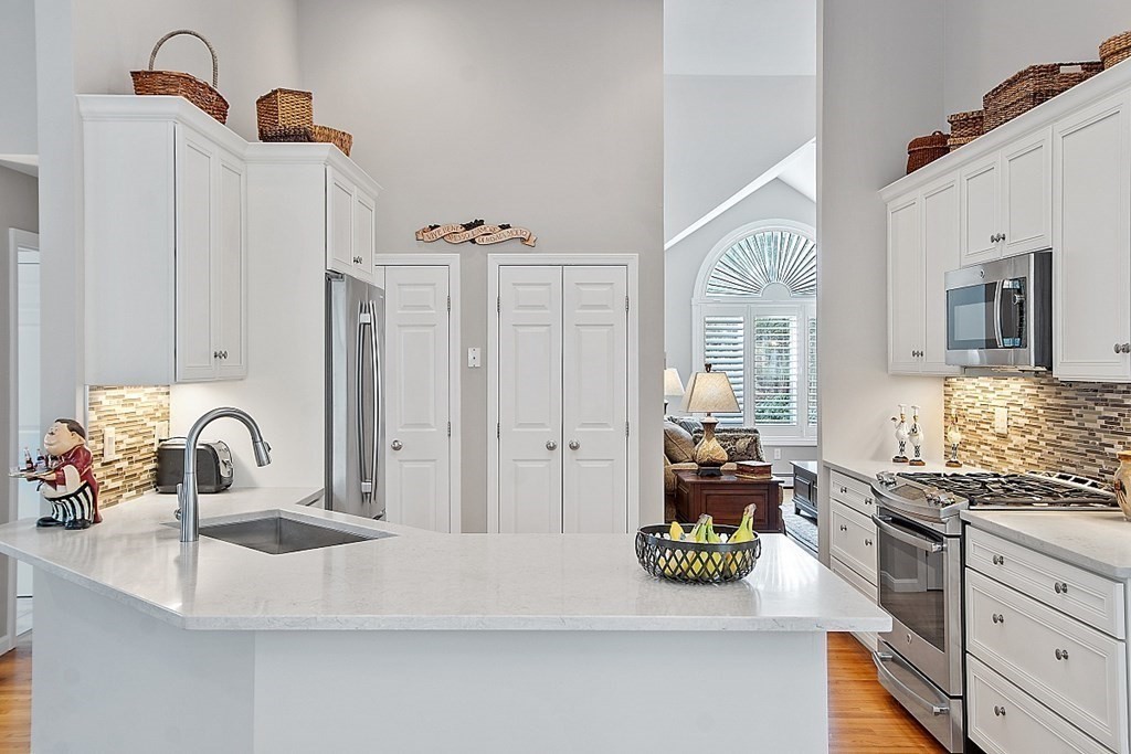 9 Joco Drive Tyngsborough, MA 01879 - Photo 13 of 38 a kitchen with a sink and appliances