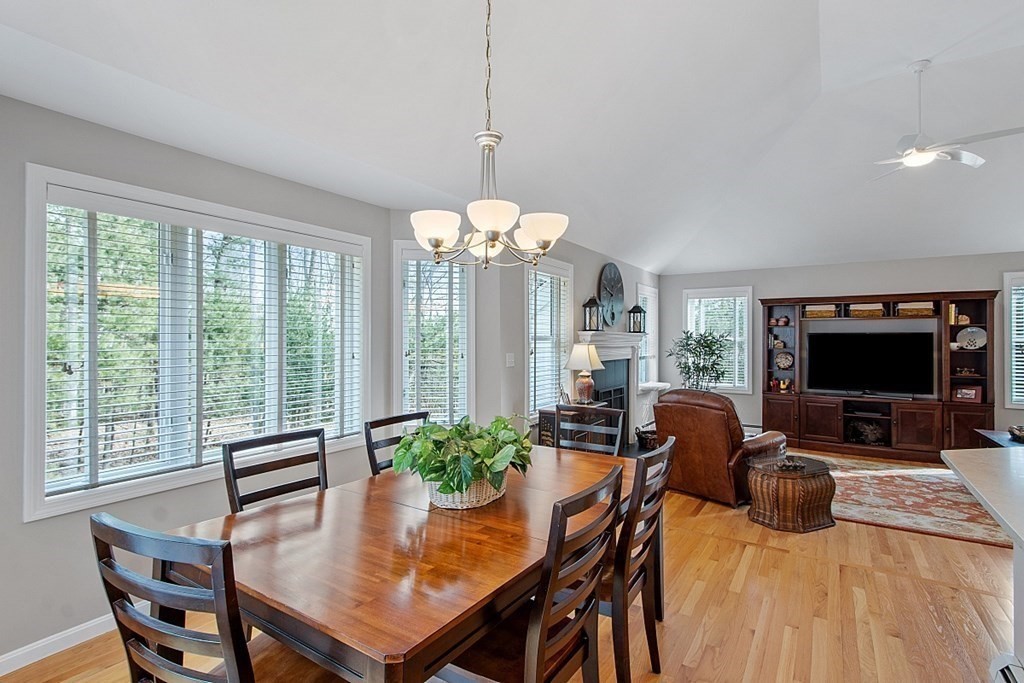 9 Joco Drive Tyngsborough, MA 01879 - Photo 15 of 38 a view of a dining room with furniture window and outside view